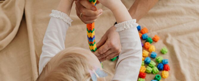 Parent talking with child during supportive child therapy session in Wheat Ridge serving Denver families