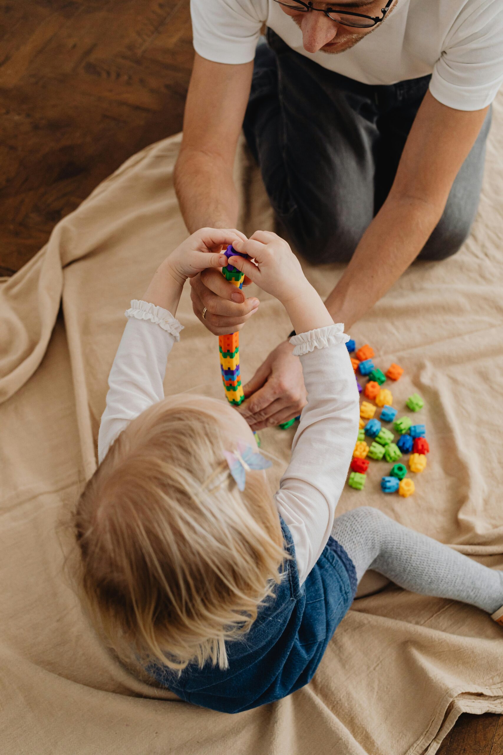 Parent talking with child during supportive child therapy session in Wheat Ridge serving Denver families