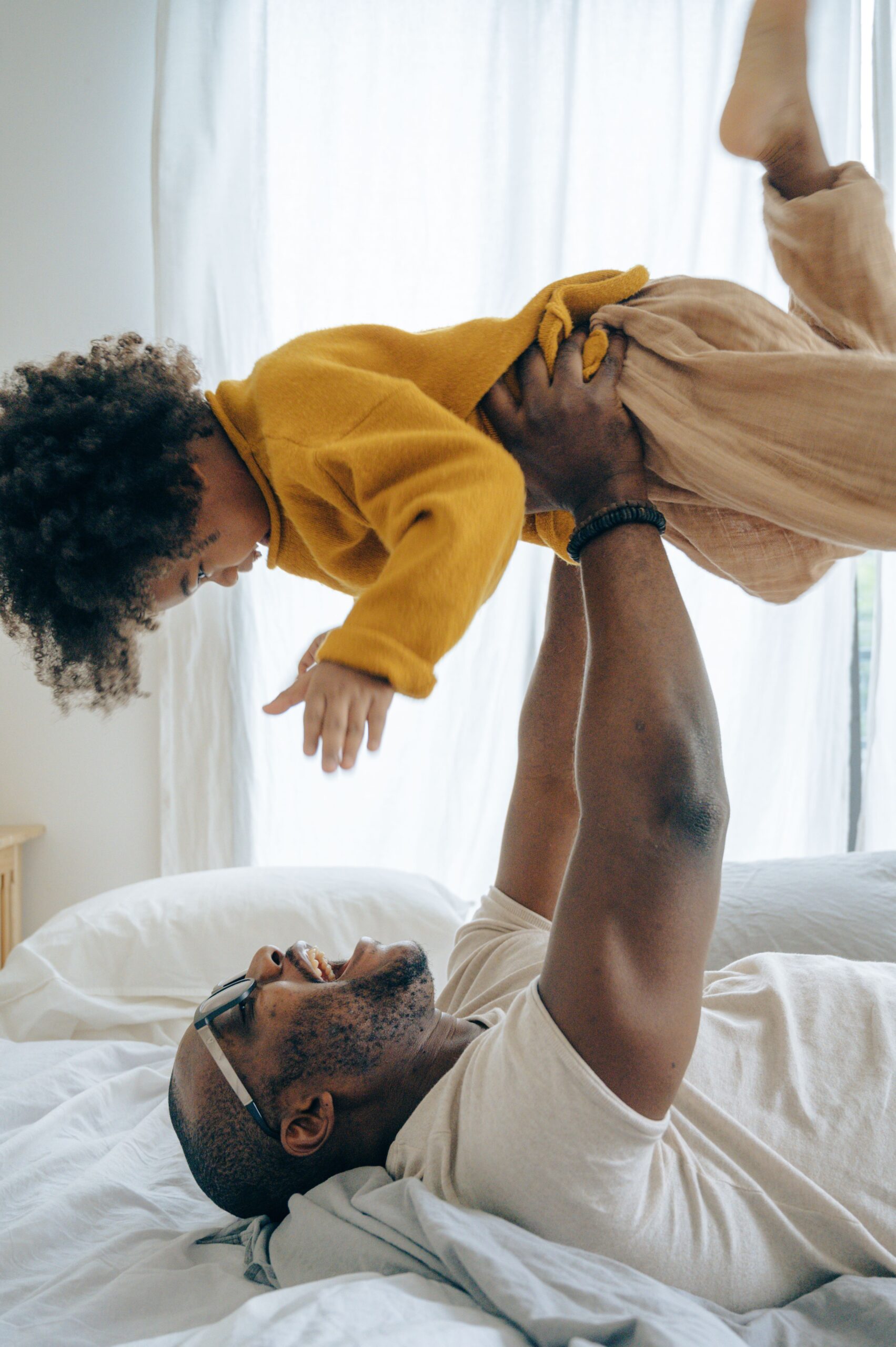 Parent and child playfully connecting