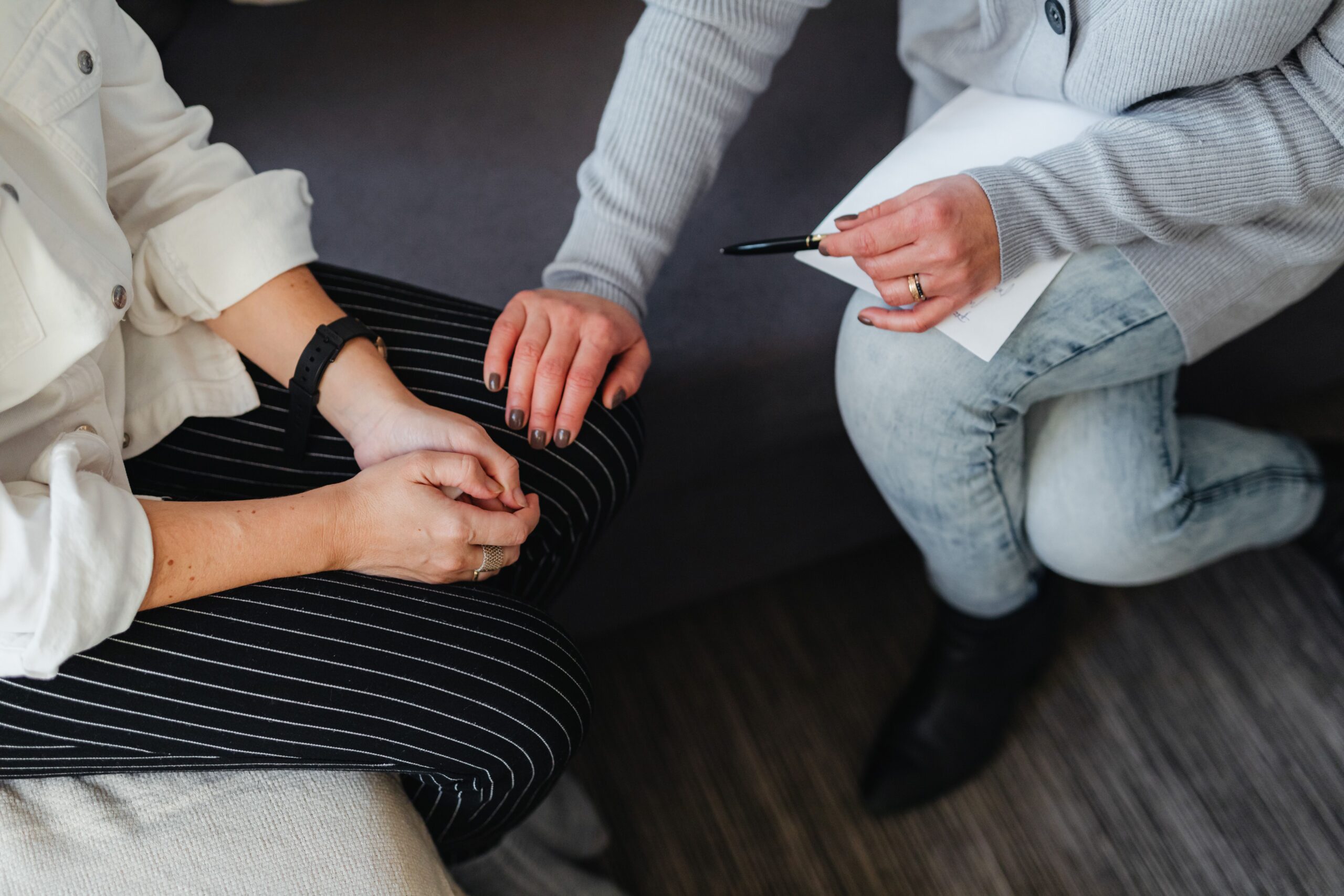 Therapist supporting adult client