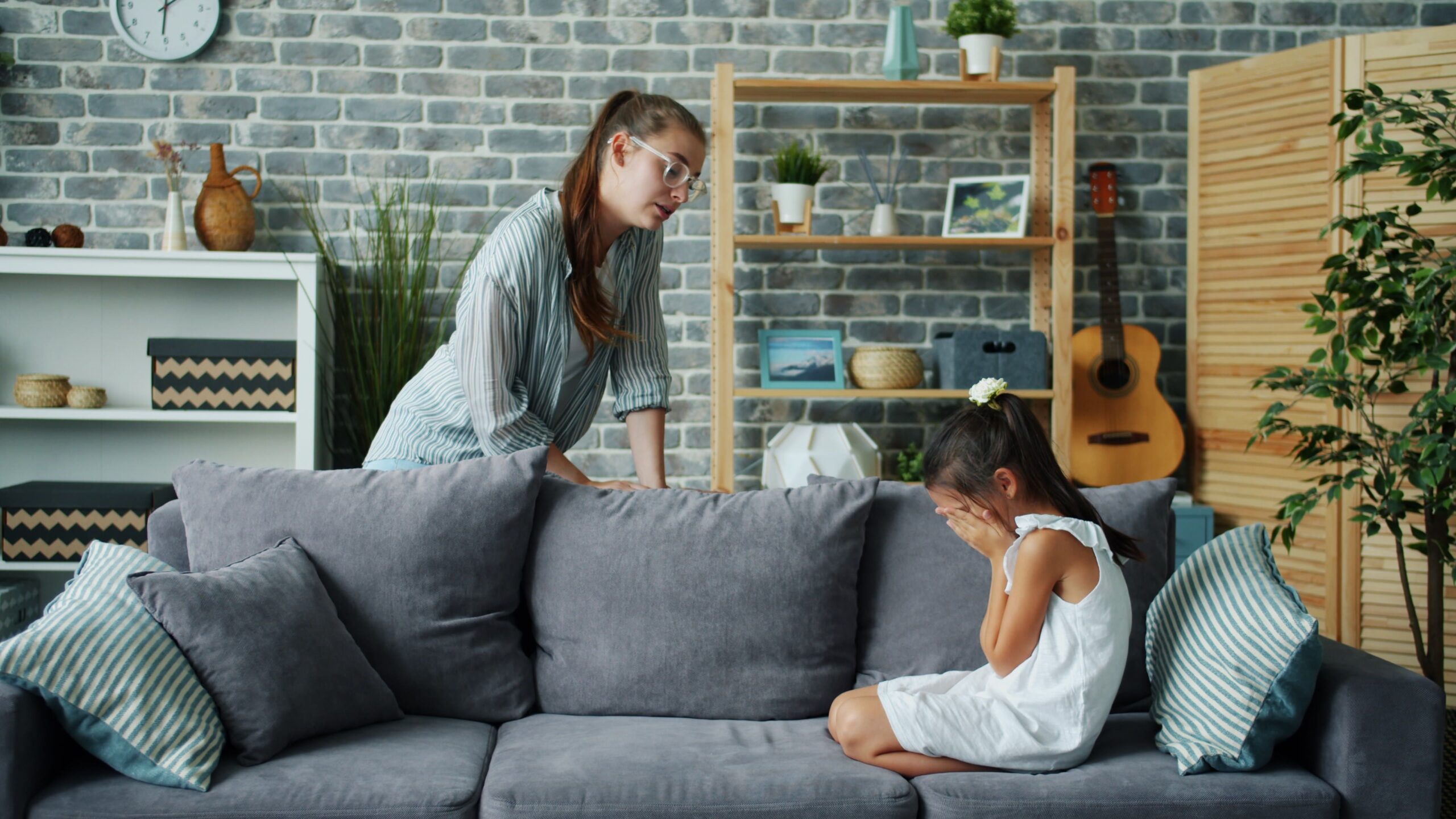 Child with big emotions and parent trying to support